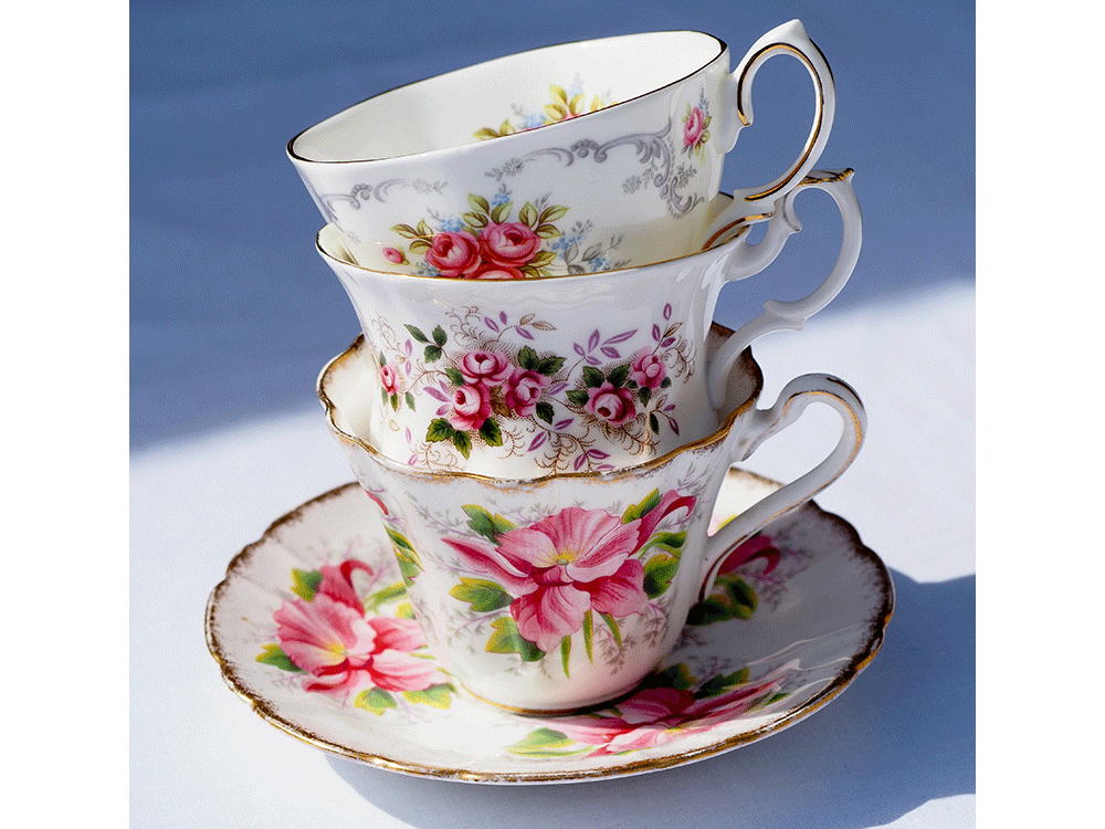 Stack of vintage china tea cups