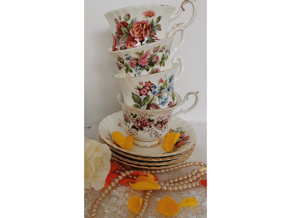 Stack of china cups and saucers