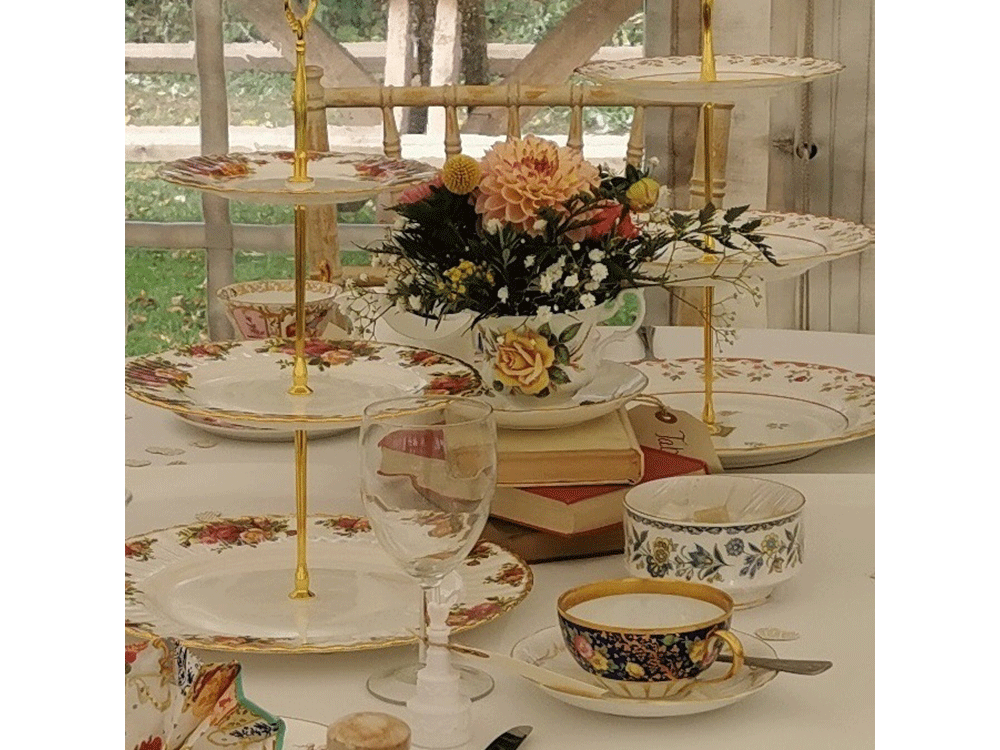 Vintage china cake stands at Wedding breakfast