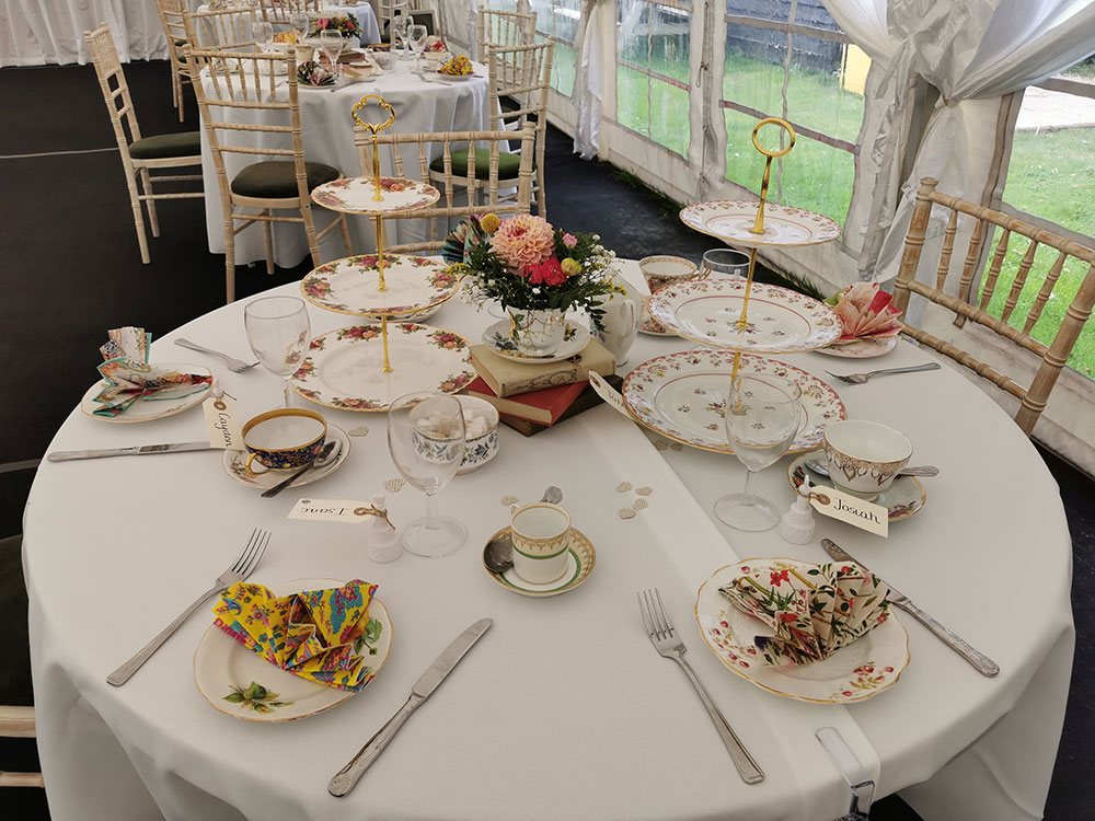 Round tables set with china for Wedding Breakfast