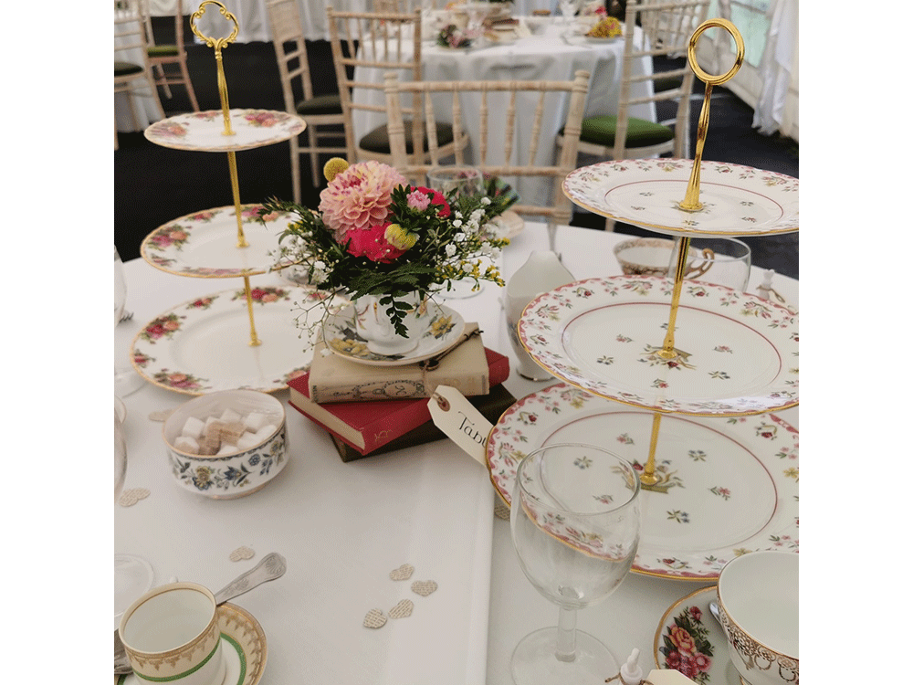 China cake stands on round table